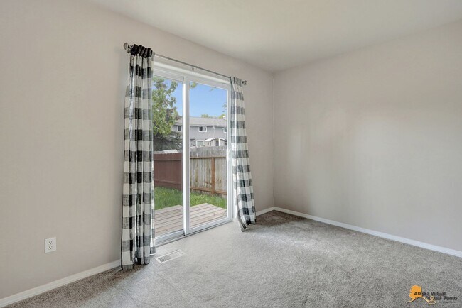 Building Photo - East Anchorage Home with Utilities Included!! Close to JBER! Attached Two Car Garage + Fenced in ...