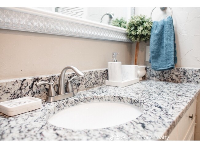 Full bathroom with shower and tub - 10216 Regal Oaks Dr