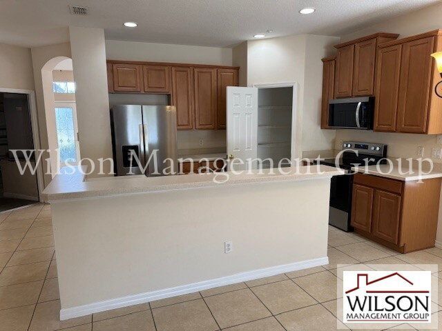 Building Photo - 9301 Mustard Leaf Dr