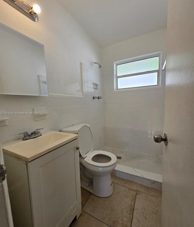Building Photo - 3971 SW 12th Pl