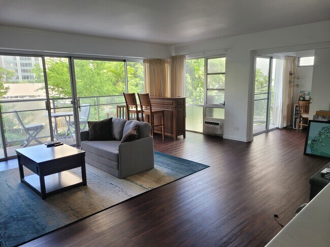 Living Room, with view of entry to 2nd bedroom - 1645 Ala Wai Blvd