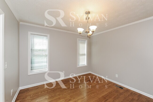 Building Photo - This lovely home is ready for your personal touch!