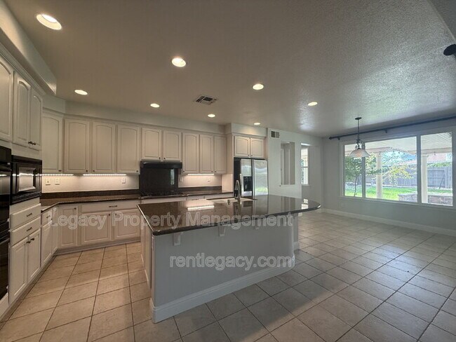 Building Photo - 8843 Latigo Ct