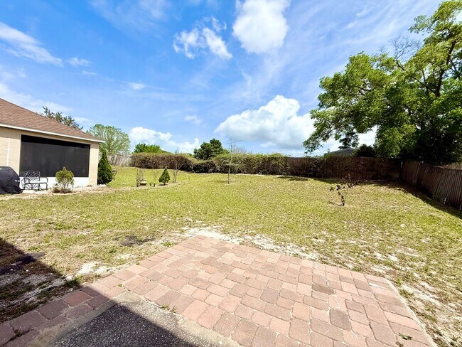 Building Photo - The perfect haven - 4Bedrooms / 2.5Bath family home at Orlando!