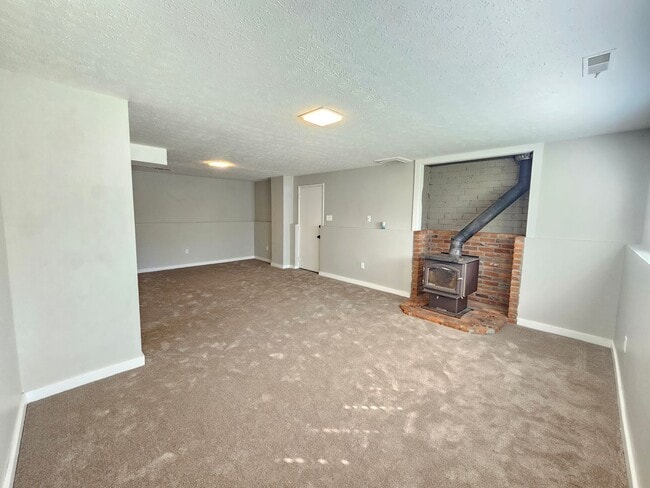 Building Photo - 1721 E 58th Ave