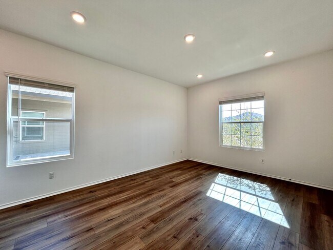 Building Photo - Spacious 4/BR 2.5/BA Two-Level Home with 3-Car Garage & Covered Deck