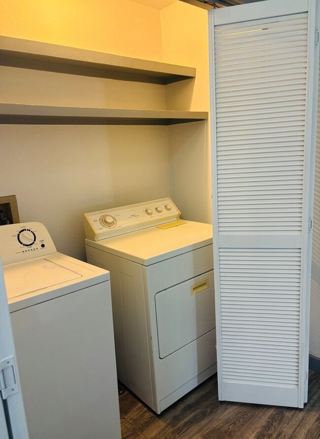 Building Photo - Renovated 3BR condo w/ garage & private yard **MOVE IN SPECIAL - $100 off each month**