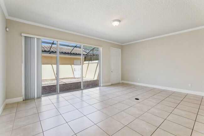 Building Photo - Gorgeous 3/3 Townhouse in VillageWalk of Lake Nona (Gated)