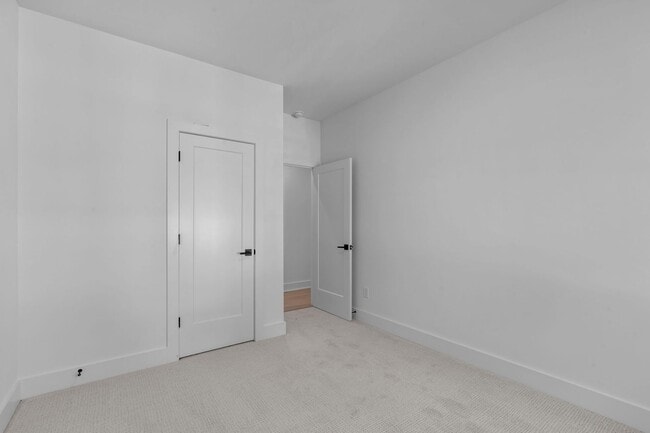 Building Photo - New Construction 4BD, 3.5BA End-Unit Ralei...