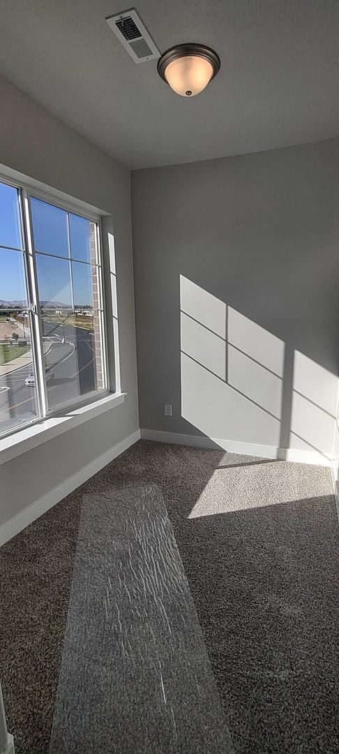 Building Photo - LIKE NEW TOP FLOOR HERRIMAN CONDO - AVAILA...