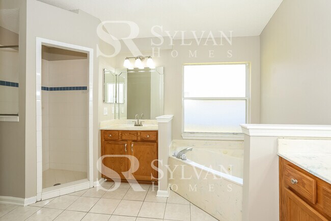 Building Photo - Lease today! No extra charge for contentme...