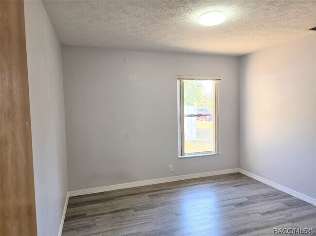 Building Photo - 8529 N Titleist Dr