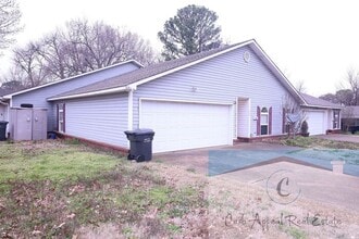 Building Photo - First month move in special $900!! Beautiful 3-bed, 2 bath condo with 2-car garage - includes was...