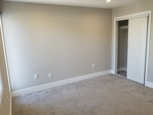 Bedroom 2 is upstairs with nice windows overlooking the front. - 935 La Posada Dr