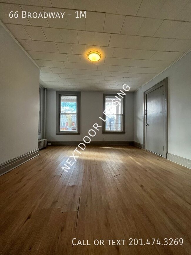 Building Photo - 66 Broadway-1M