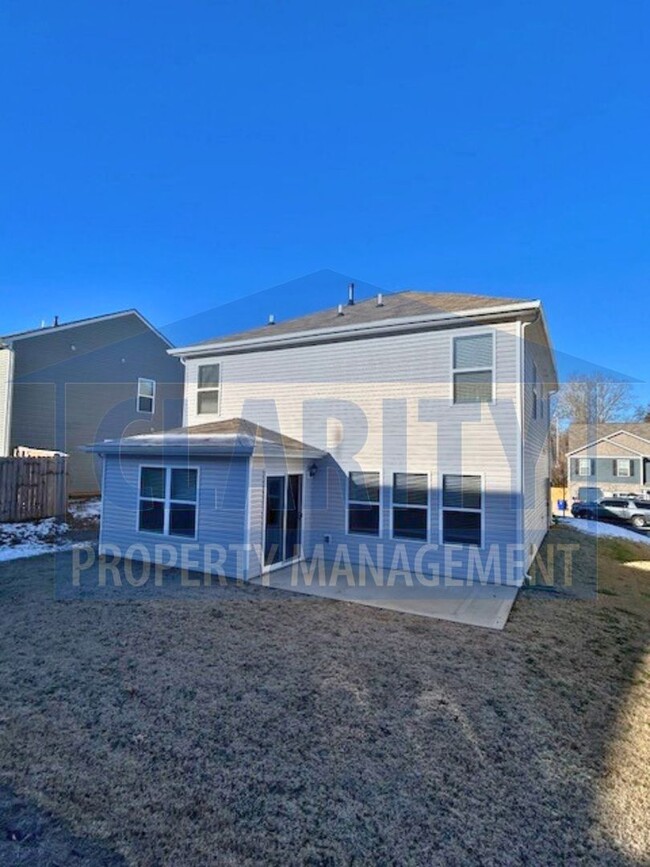 Building Photo - Modern, four bedroom home in a quiet neigh...