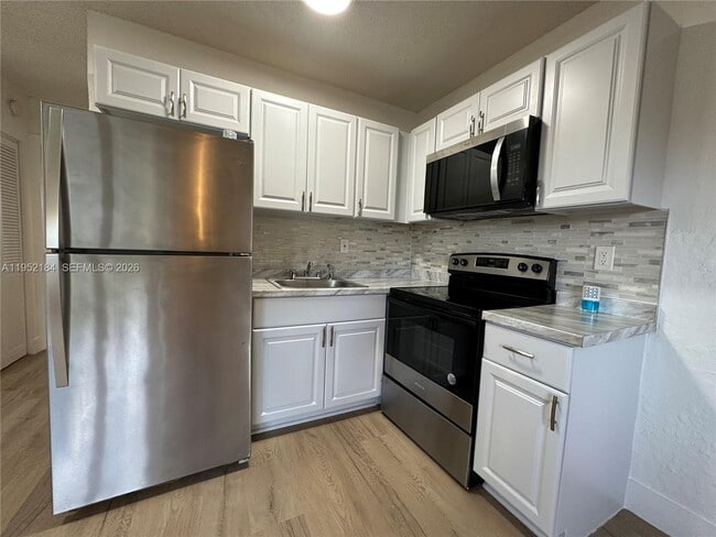 Building Photo - 3616 NE 11th Ave