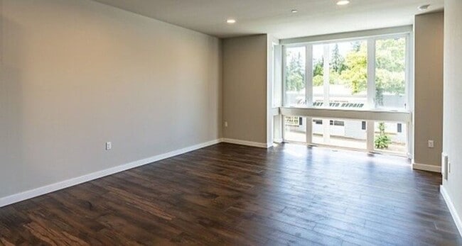 Building Photo - Brand New Pinehurst Home with Hardwood Floors & Easy I-5 Access