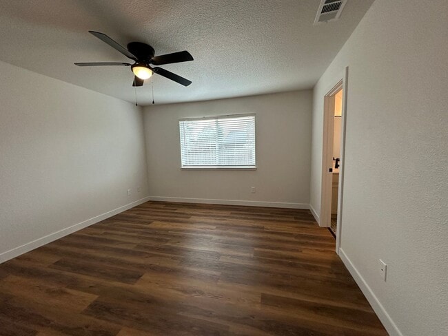 Building Photo - Updated Home with Island Kitchen, LVP Flooring, and Yard Care Included!