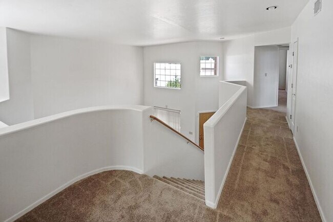 Building Photo - Elegant 4-Bed Home with Balcony & Backyard...