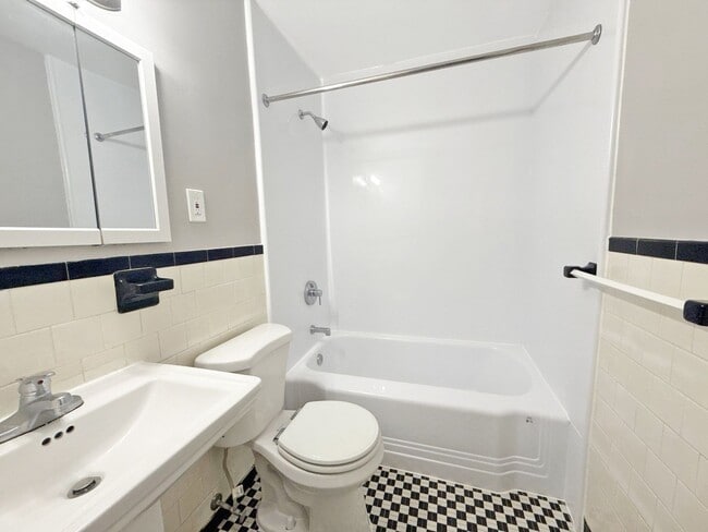 Building Photo - Updated 3BR Home with Bonus Lower-Level Space & Off-Street Parking