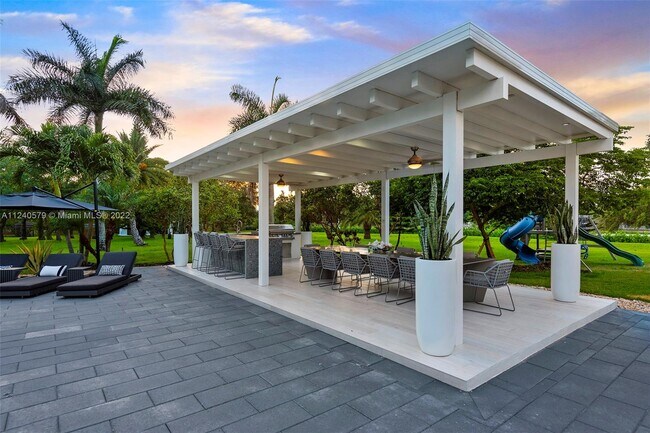 Building Photo - 5801 Melaleuca Rd