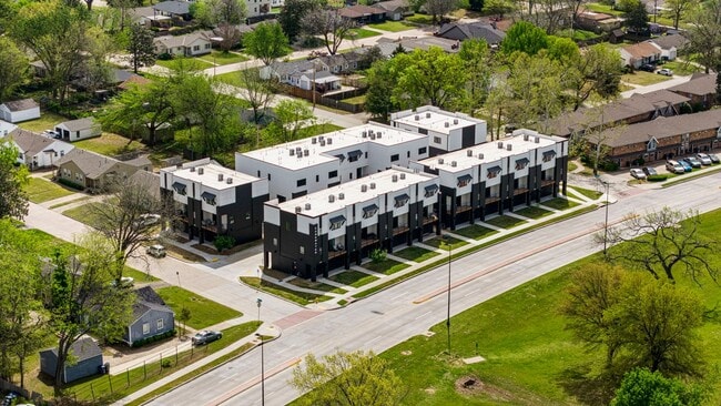 Building Photo - Discover modern elegance in the newly constructed Edgewater Condominiums, a boutique community fe...