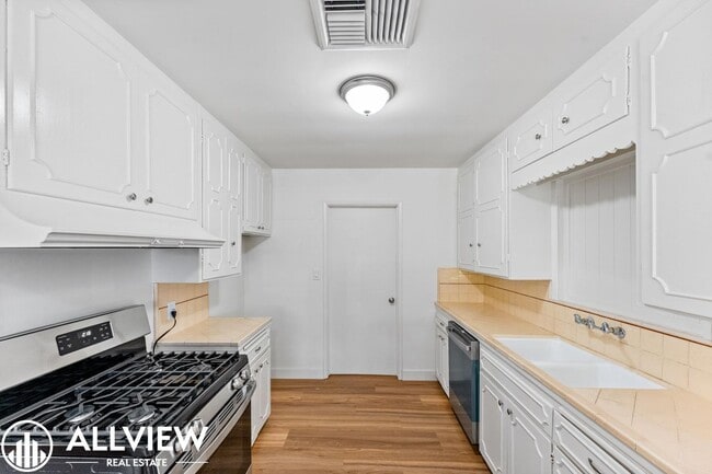 Building Photo - Stylishly Renovated Santa Ana Gem – 4-Bedroom Single-Story with Modern Upgrades & RV Parking