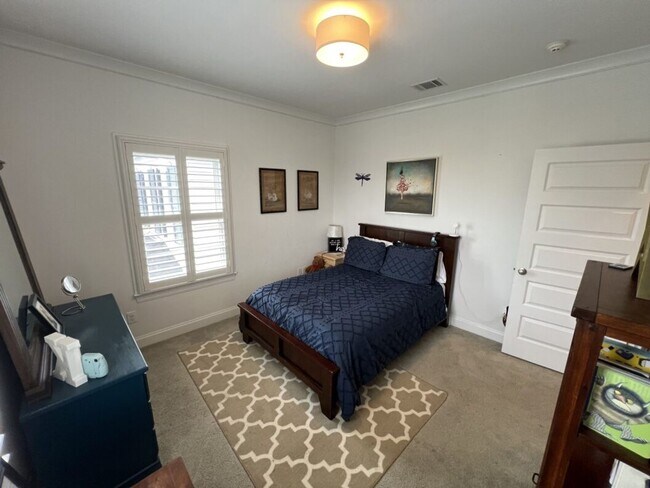 Building Photo - Luxury 4BR Home in Americana | 11 Ft Ceilings, Courtyard Living & Furnished Option at $3,950