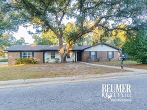 Building Photo - Charming Corner Haven 4BR/3BA Brick Home for Rent