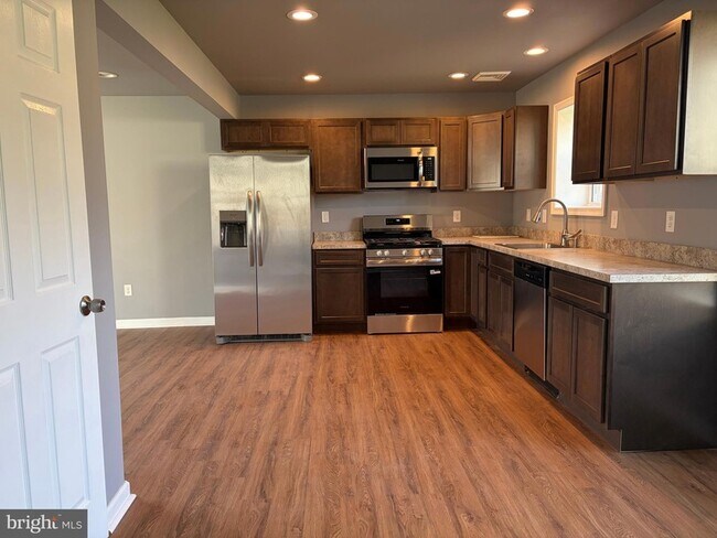 Building Photo - 5517 Schumacher Dr