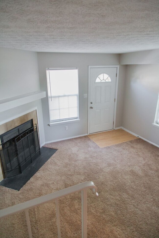 Building Photo - Enjoy Freshly Painted Open Floor Plan!
