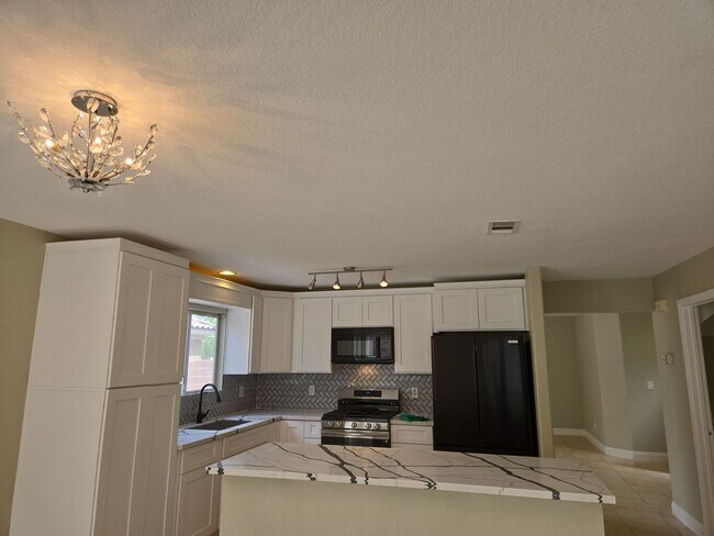 Building Photo - A Fabulous 4 Bedroom Home in Peccole Ranch