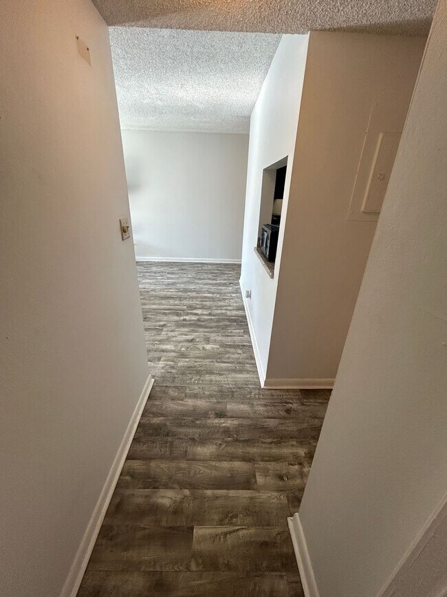 Building Photo - Now Leasing: 1-bedroom and 1.5 bath condo ...