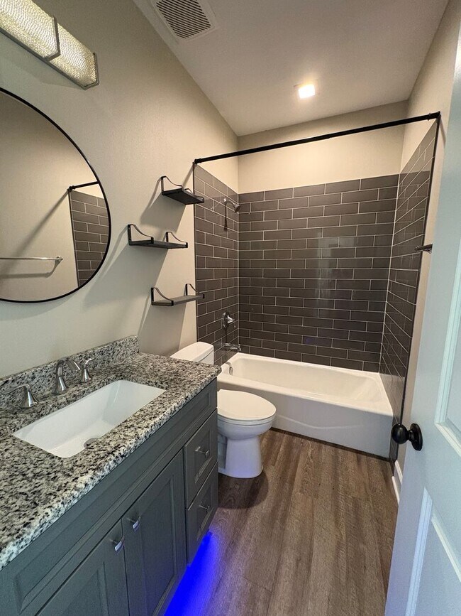 Building Photo - Available Now: Expansive 4BR Home with Rare 3-Bay Carport