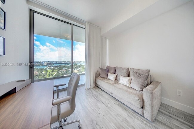 Building Photo - 10203 Collins Ave
