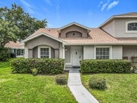Building Photo - Island Cove Villas at Meadow Woods 1-Story...