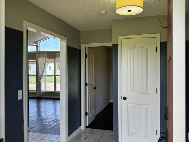 Building Photo - Available July 2025! 4-Bedroom, 2-Bathroom...