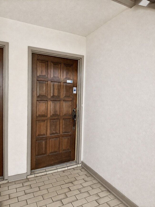 Building Photo - Single-level living on ground floor  |  Fresh paint (July 2026)  |  2 carports  |  Community Pool...