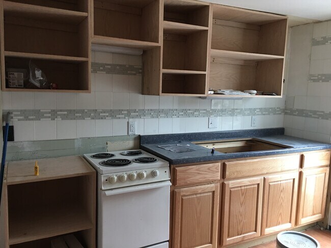 Building Photo - Johnson Village Apartments, LLC