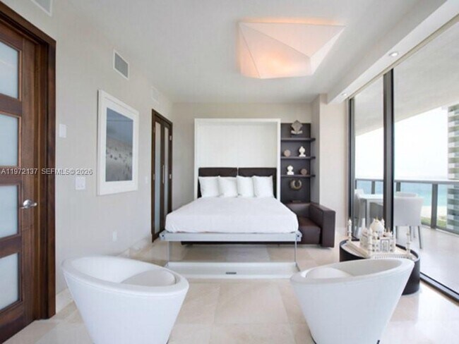 Building Photo - 5875 Collins Ave