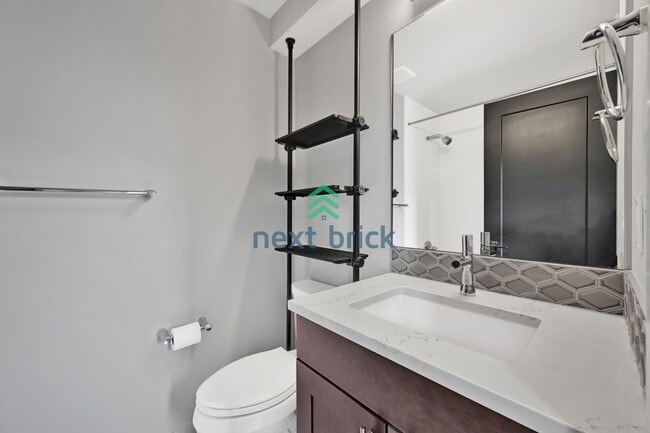 Building Photo - Sleek and Spacious Townhome with Gourmet K...