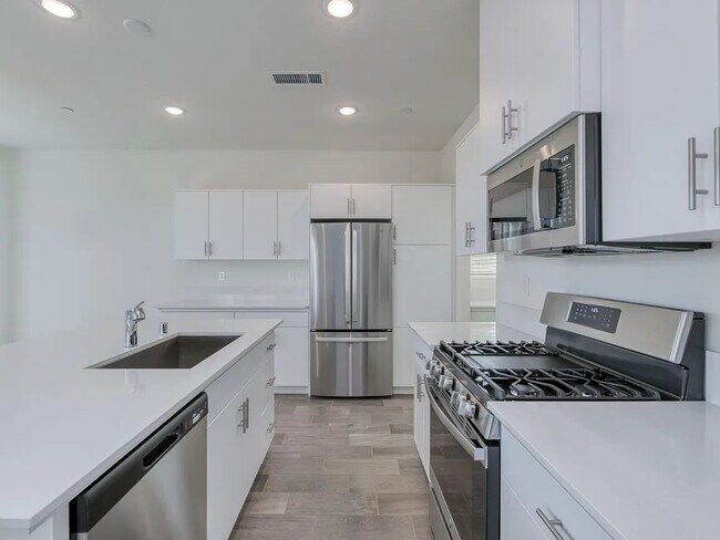 Building Photo - NEW! Modern, Wilson Home. 3 bedrooms / 2.5-bathroom single-family home in a quiet gated community...