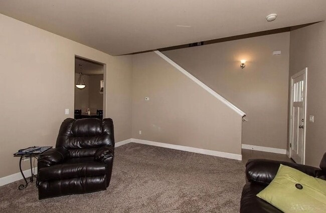 Building Photo - Spacious 4-Bedroom Home with New Paint & Carpet, Fenced Yard