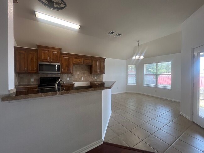 Building Photo - Meander Estates! Large corner lot 3/2/2 Coming August 2025. Covered patio!