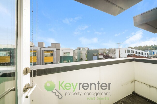 Building Photo - **Rent Special** Modern Two Bedroom Townhome with Designated Parking