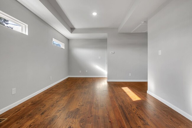 Building Photo - Modern Comfort Meets Prime Location — Stylish 2-Story Townhome