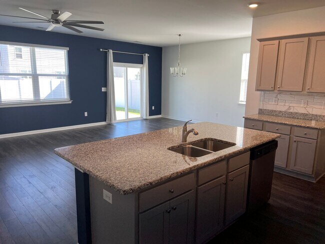 Building Photo - Four-Bedroom, Three-Bath, Unfurnished Hous...