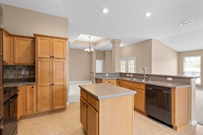 Building Photo - 5659 Tiger Woods Dr