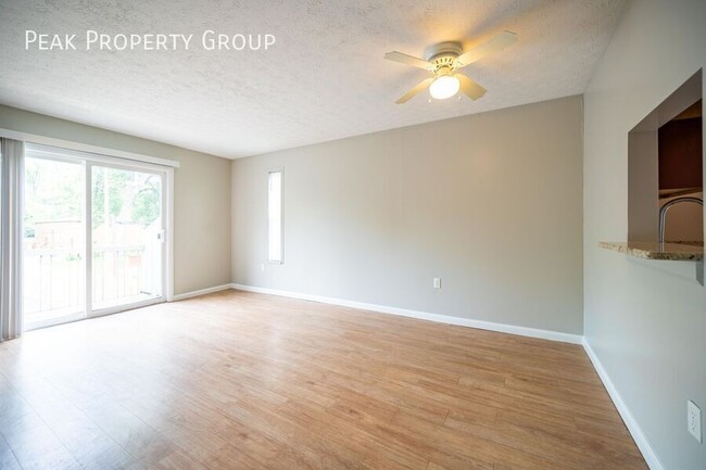 Building Photo - Available in May! Located on a quiet stree...